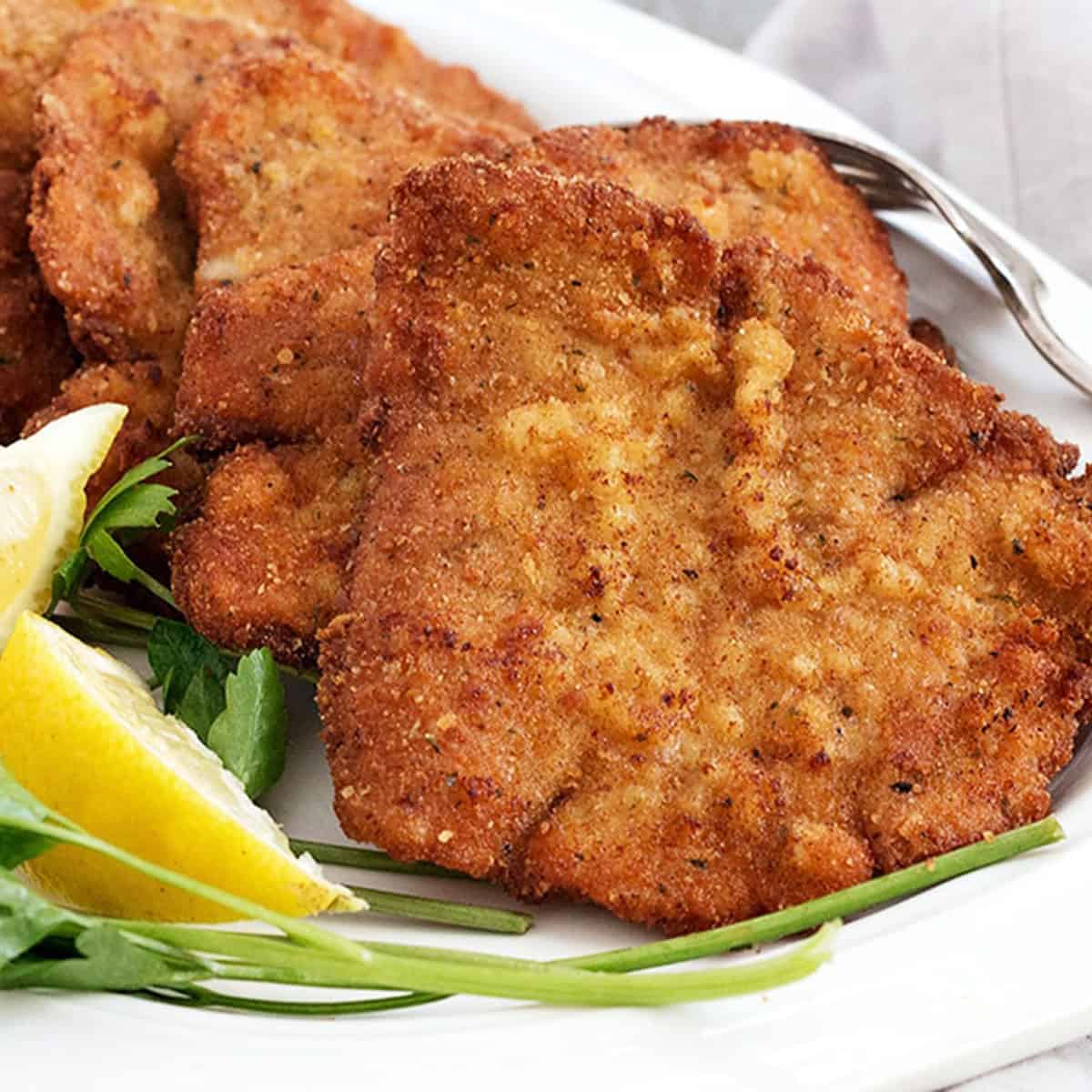 Classic Pork Schnitzel - Seasons and Suppers