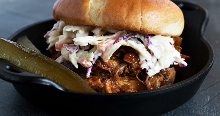 pulled pork on bun with coleslaw