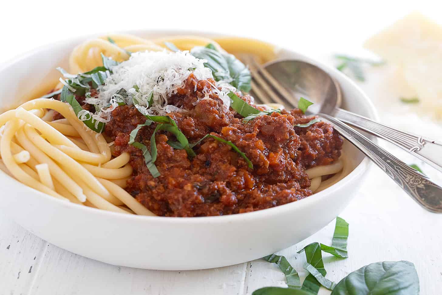 Classic Italian meat sauce on spaghetti in a bowl.