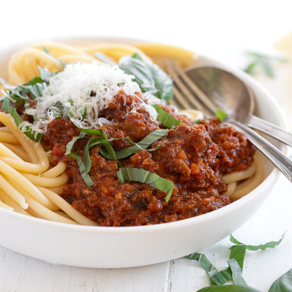 Classic Italian meat sauce on spaghetti in a bowl.