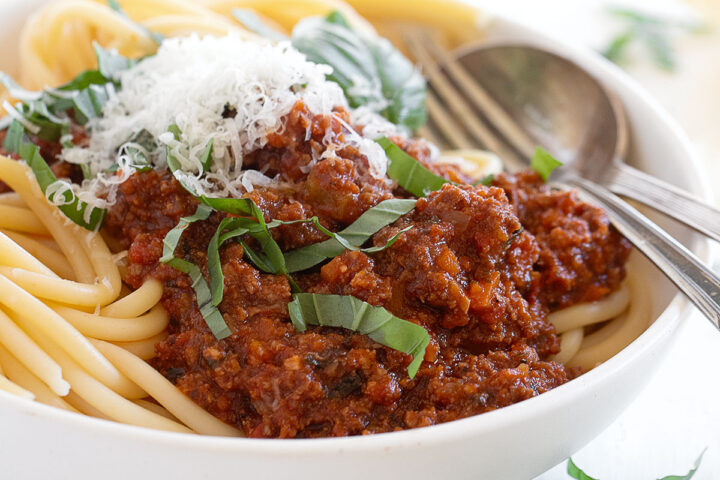 Classic Italian meat sauce on spaghetti in a bowl.