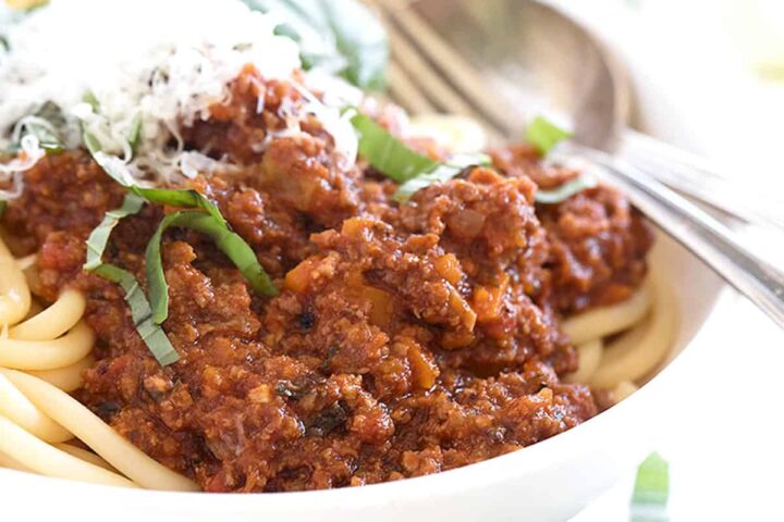 Italian meat sauce in bowl with pasta