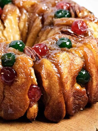 festive pull apart bread wreath with red and green cherries