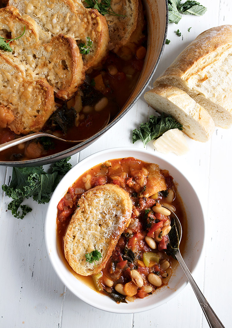 ribollita soup in bowl with bread slice on top