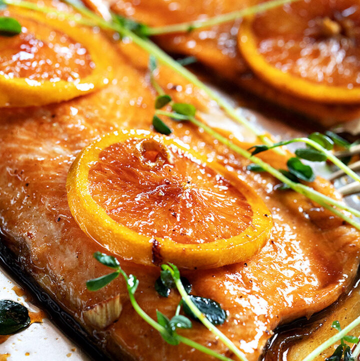 Asian orange salmon on baking sheet