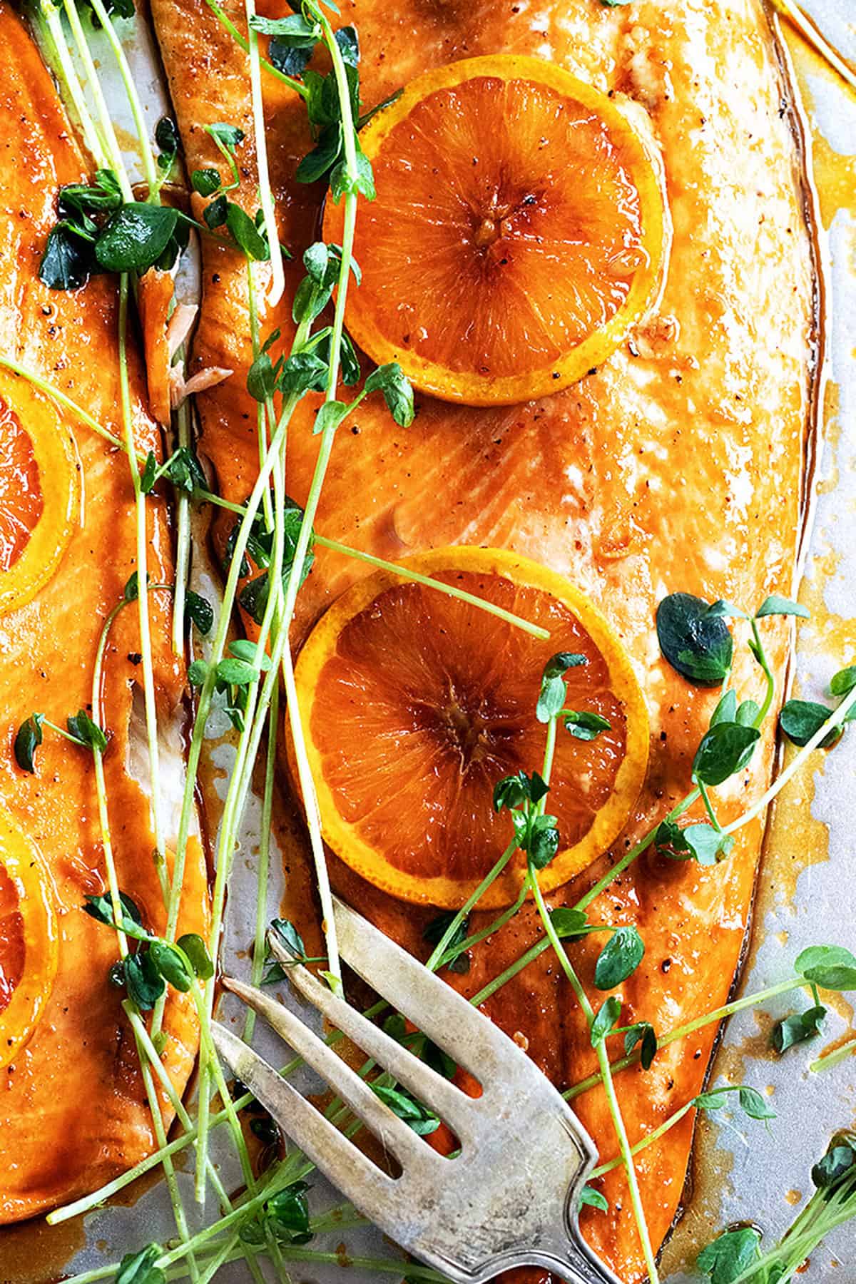 Asian orange salmon on baking sheet