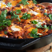 chili style shakshuka in a cast iron skillet