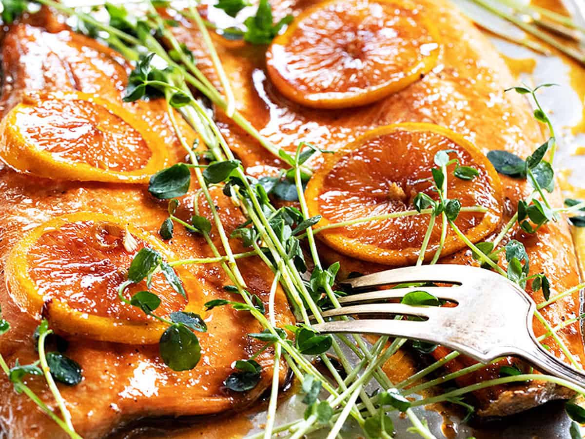 Asian orange salmon on baking sheet