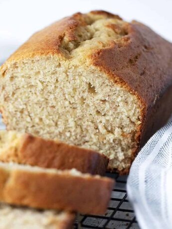 2-banana banana bread sliced on cooling rack