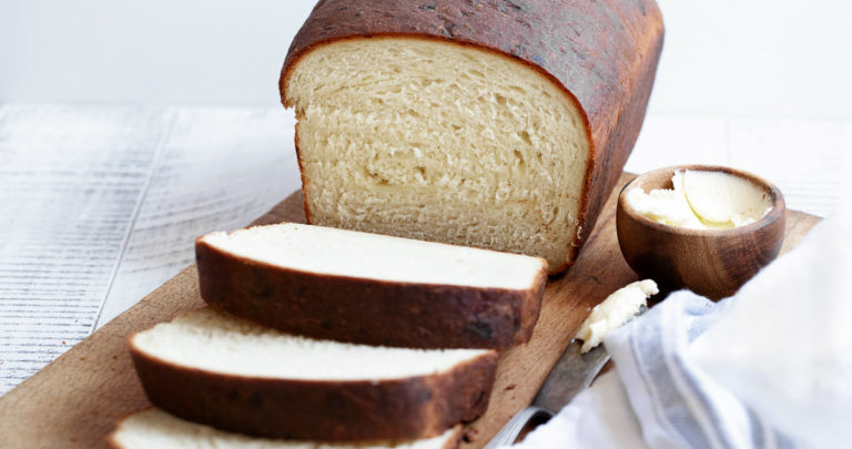 buttermilk yeast bread sliced on cutting board