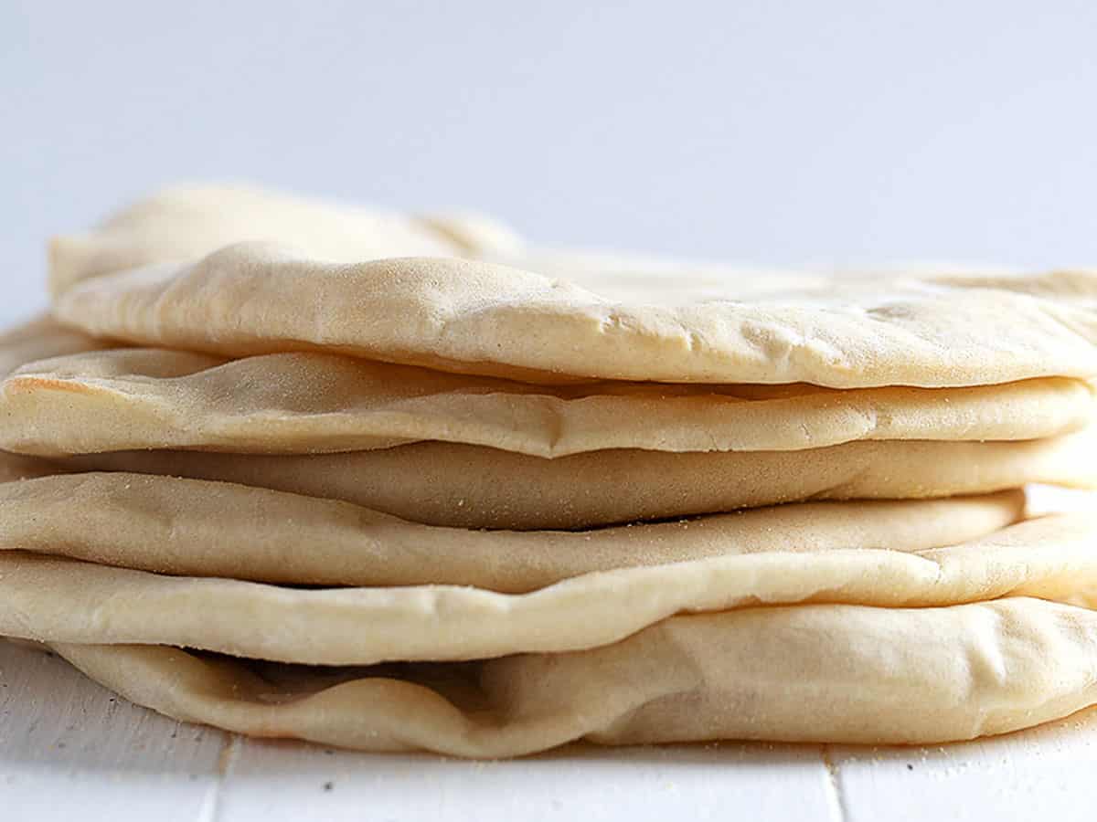 homemade pita bread with pockets stacked