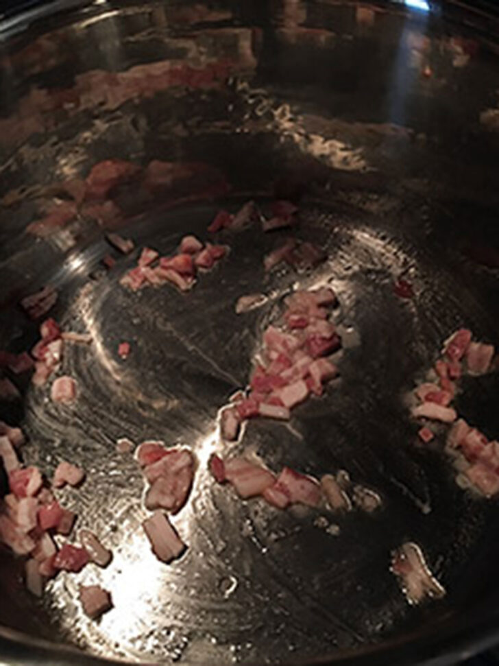 Pancetta cooking in the soup pot.