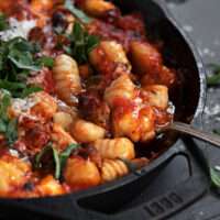 baked gnocchi with sausage in skillet