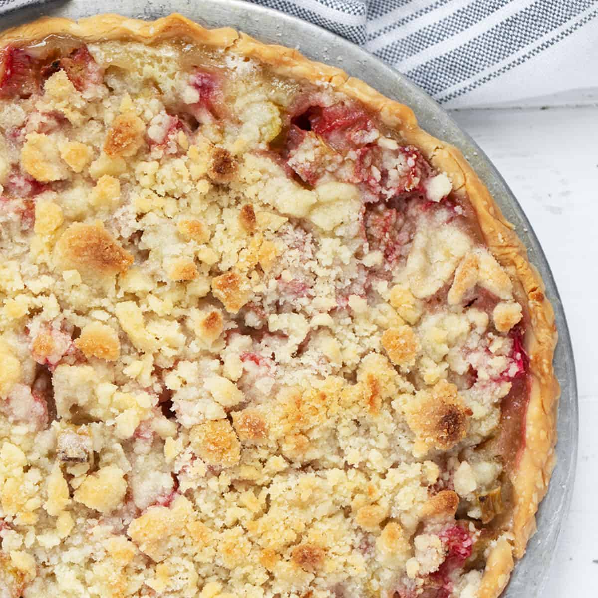 Rhubarb crumb pie in the pie plate.