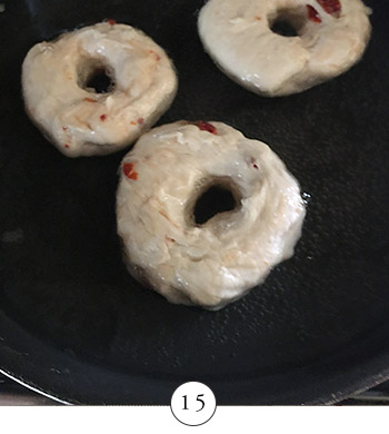 simmering bagels in water