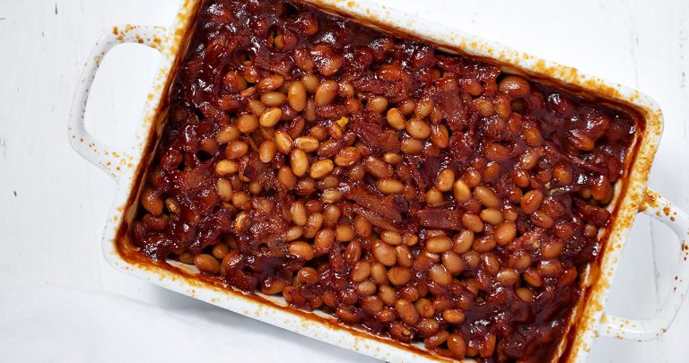 baked beans in white casserole dish