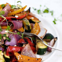 grilled vegetable salad in white bowl