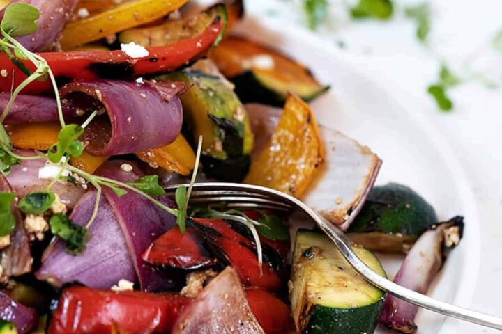 grilled vegetable salad in white bowl