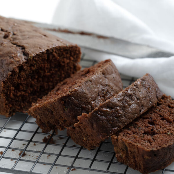 Chocolate Zucchini Bread sliced on cooling rack