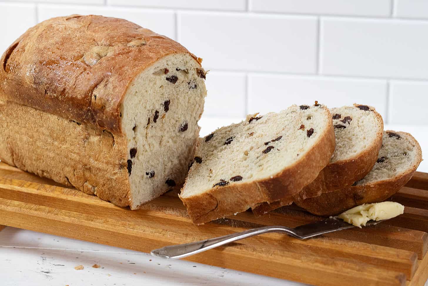 raising bread sliced on cutting rack