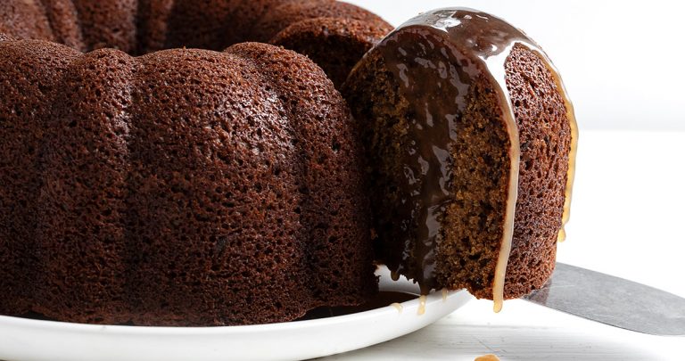 sticky toffee bundt sliced with toffee sauce