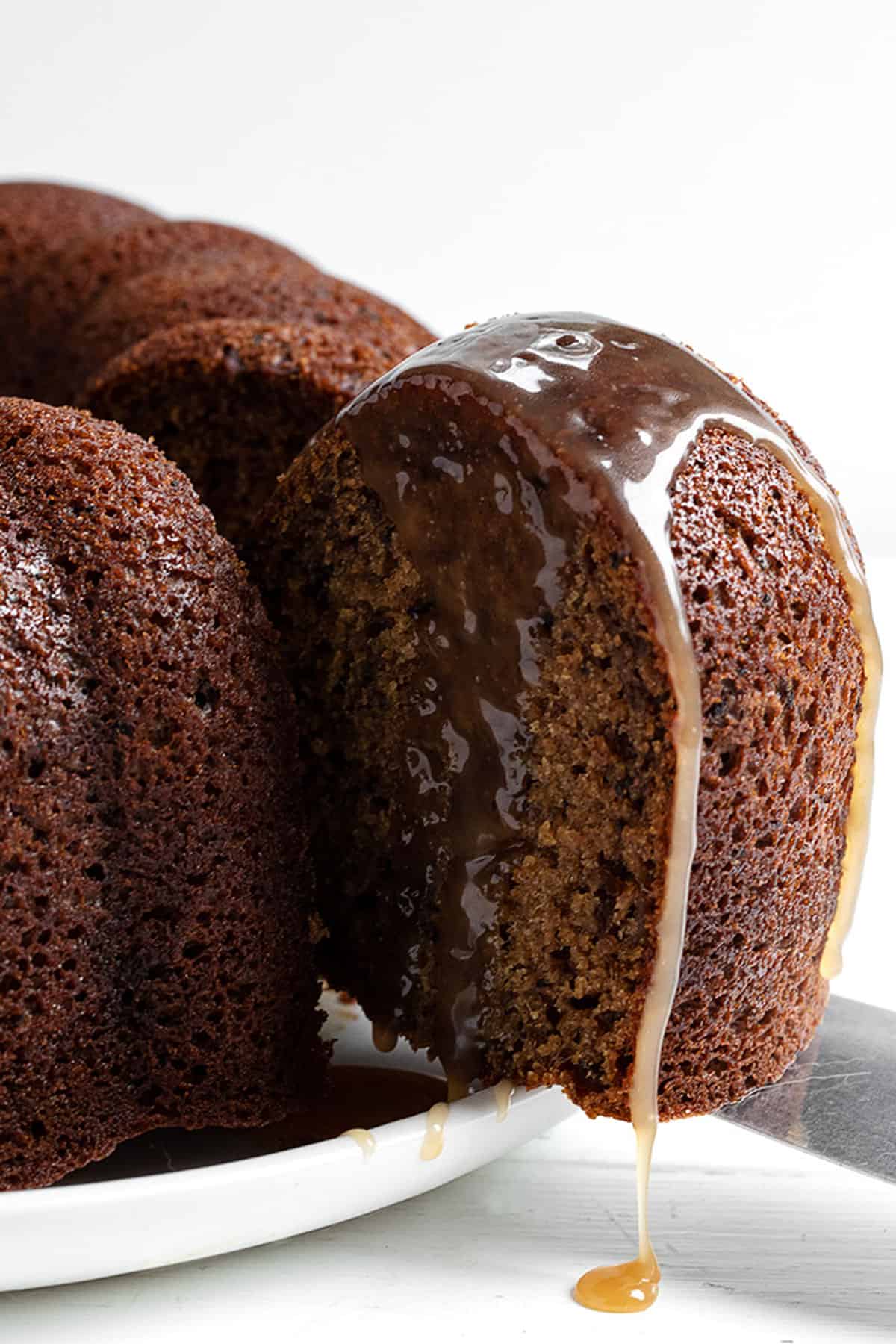 sticky toffee bundt cake sliced o plate