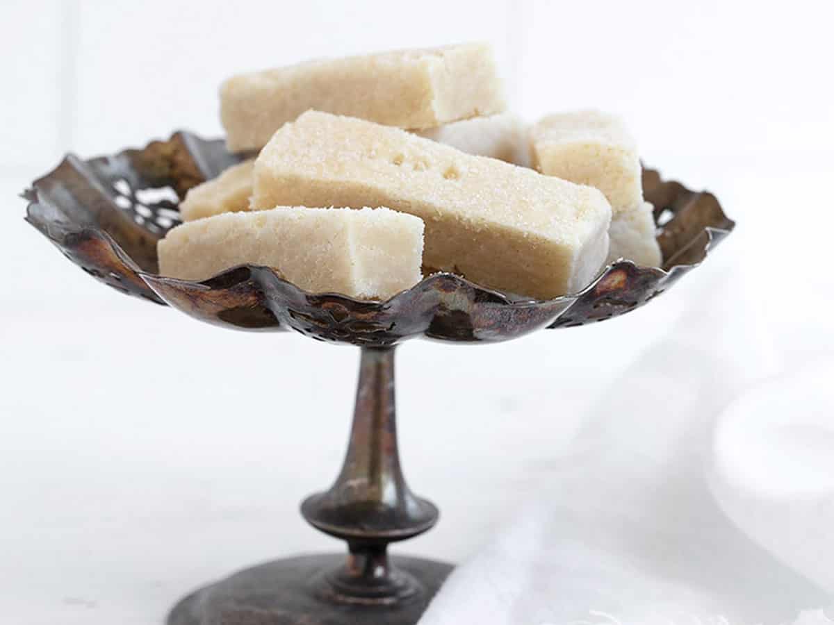 sheetpan shortbread cookies on vintage silver tray