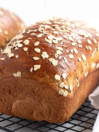 oatmeal molasses bread on cooling rack