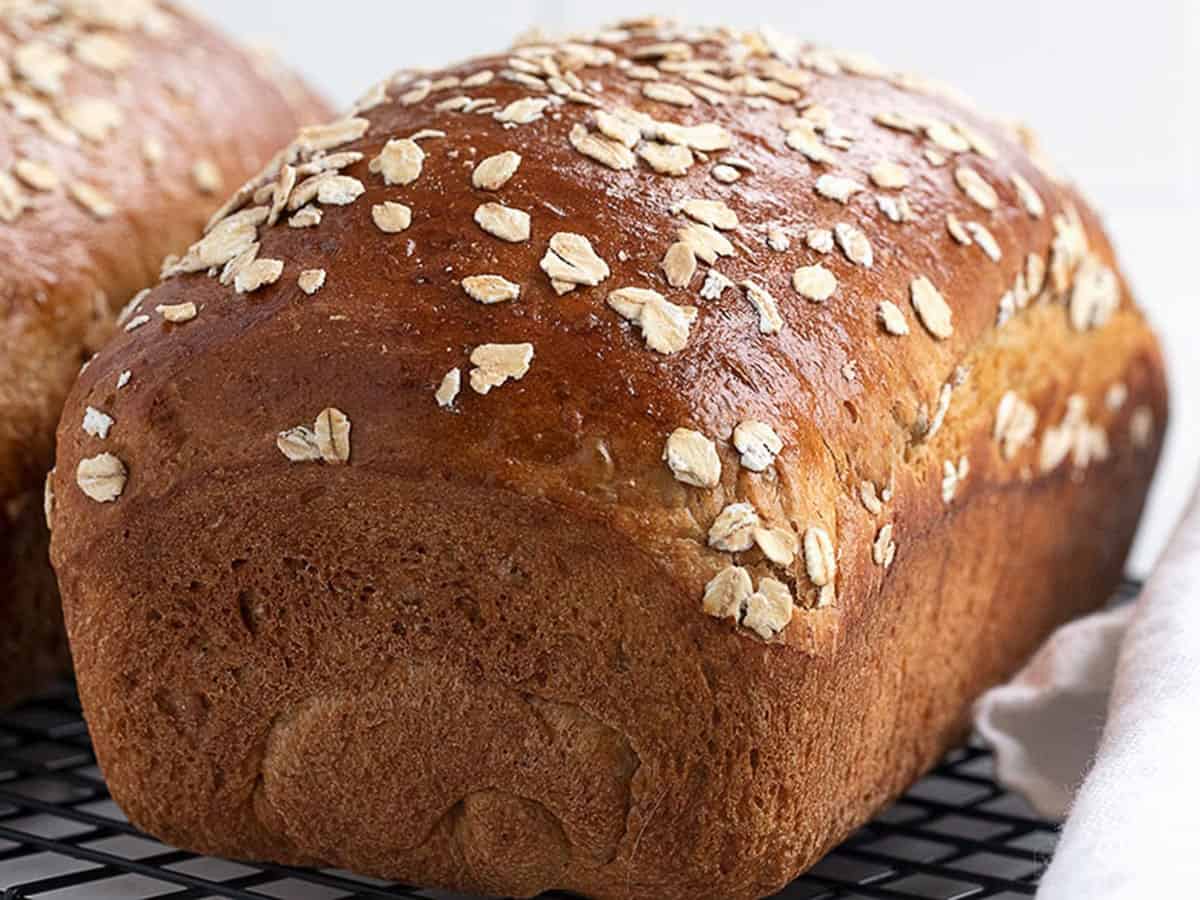 oatmeal molasses bread on cooling rack