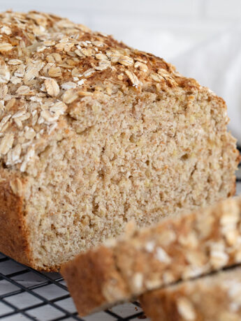Irish brown soda bread sliced on cooling rack