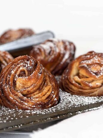 cinnamon sugar cruffins in muffin tin