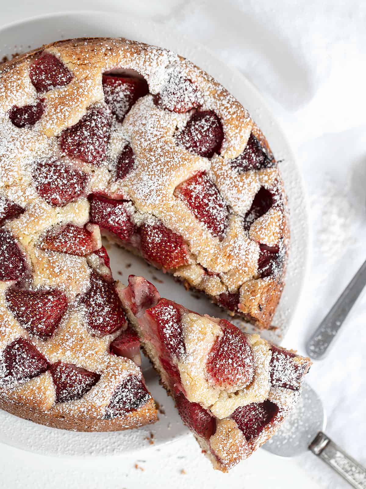 strawberry yogurt cake overhead, sliced