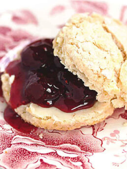 Strawberry balsamic black pepper jam on a scone.