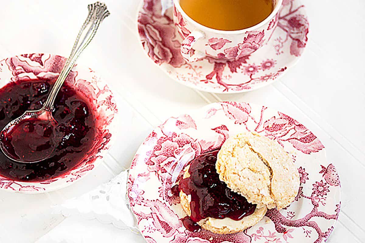 Strawberry balsamic black pepper jam on a scone.