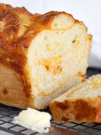 jalapeno corn cheese bread sliced on cooling rack