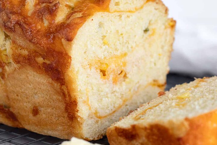 jalapeno corn cheese bread sliced on cooling rack