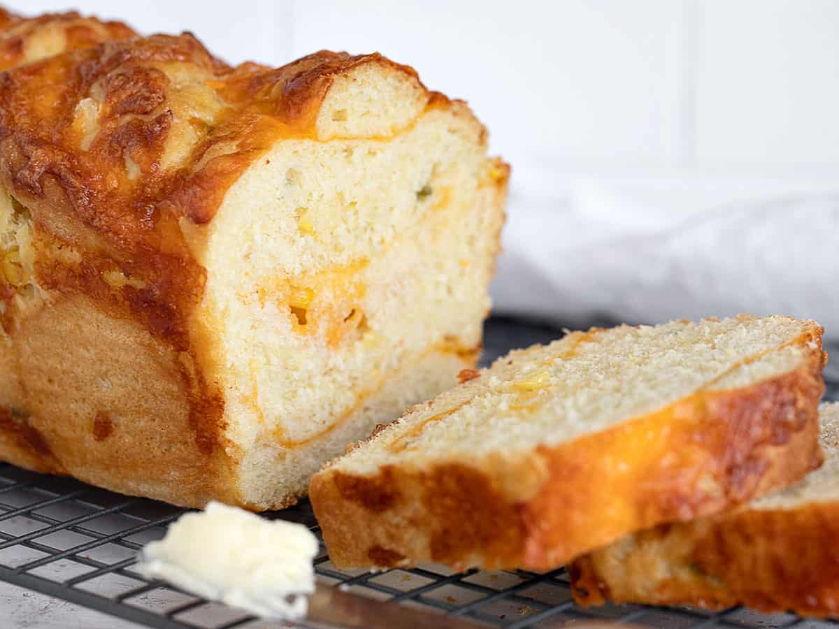jalapeno corn cheese bread sliced on cooling rack