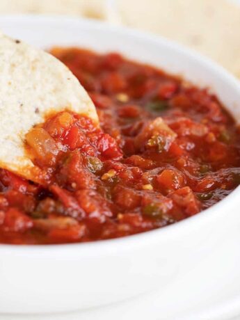 salsa in white bowl with tortilla chips