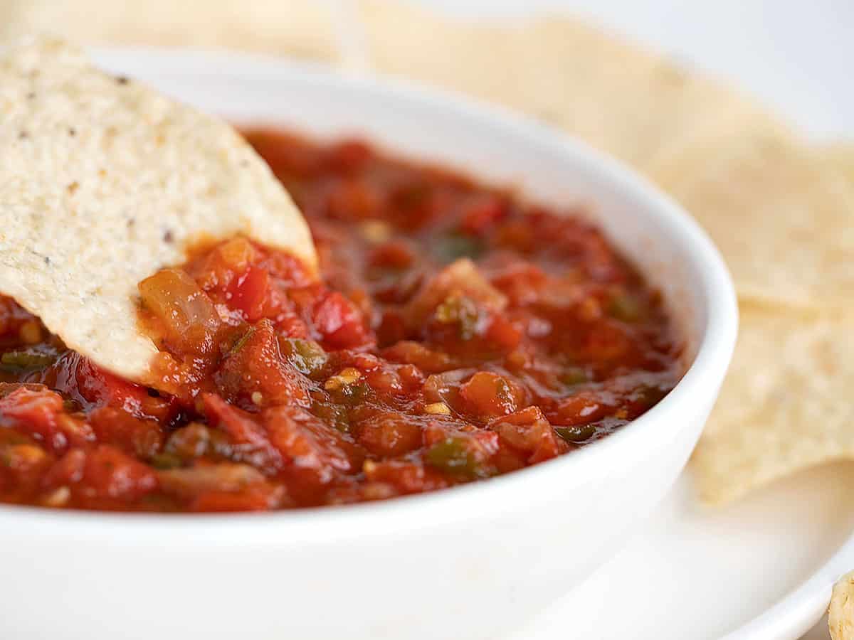 salsa in white bowl with tortilla chips