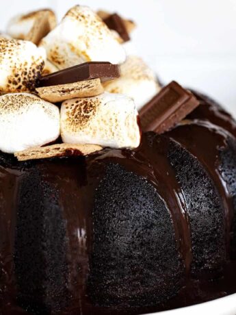 s'mores bundt cake topped with marshmallows