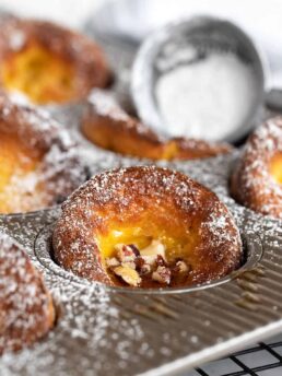 mini pumpkin Dutch baby pancakes in muffin tin