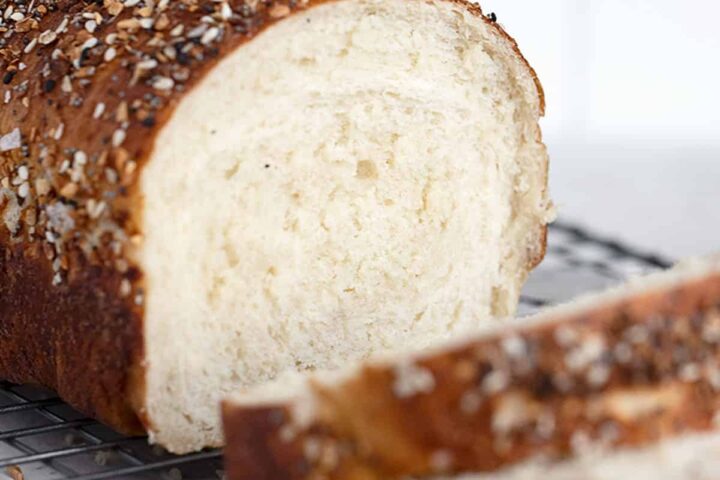 bagel bread sliced on cooling rack