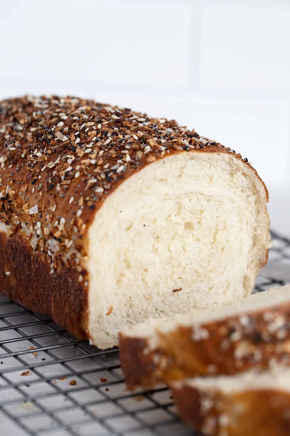 bagel bread sliced on cooling rack