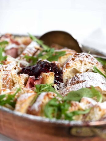 savoury ham and cheese bread pudding in baking dish