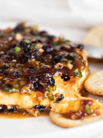 curried cheese spread with mango chutney on top