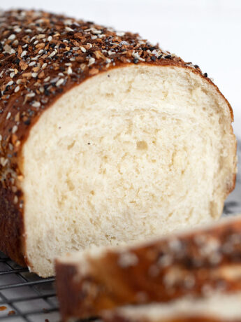 bagel bread sliced on cooling rack