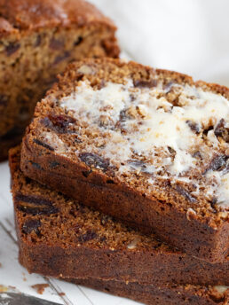 Date nut bread sliced and buttered.