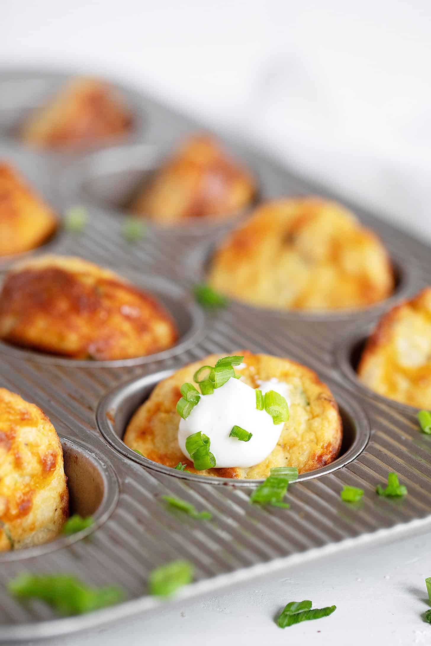 Mashed potato muffin in muffin tin.