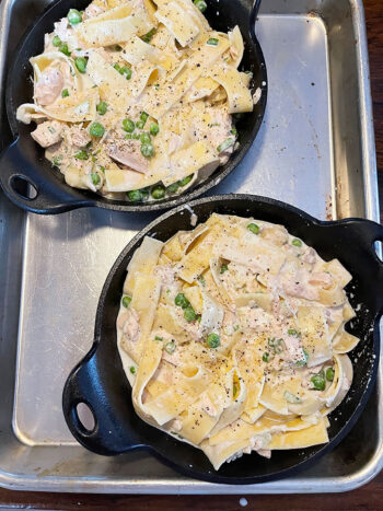 tuna casserole spooned into small skillets