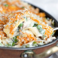 tuna noodle casserole in baking dish with spoon